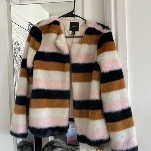 I just never wear it and never have! Super soft, brand new!